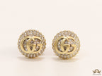 Gold plated cz softy shape studs with twin G motif