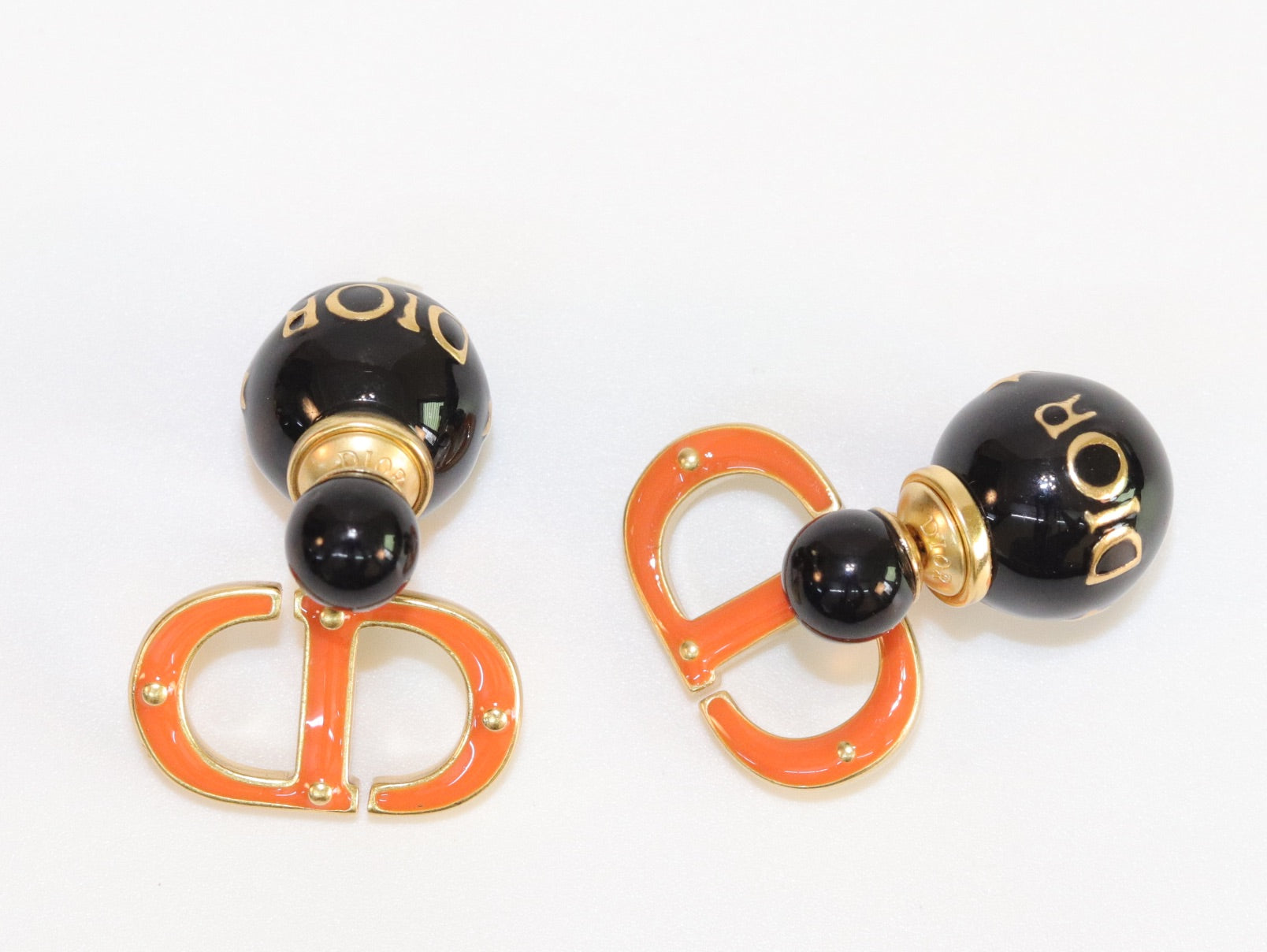 Black and Orange alphabet C and D stud in gold finish