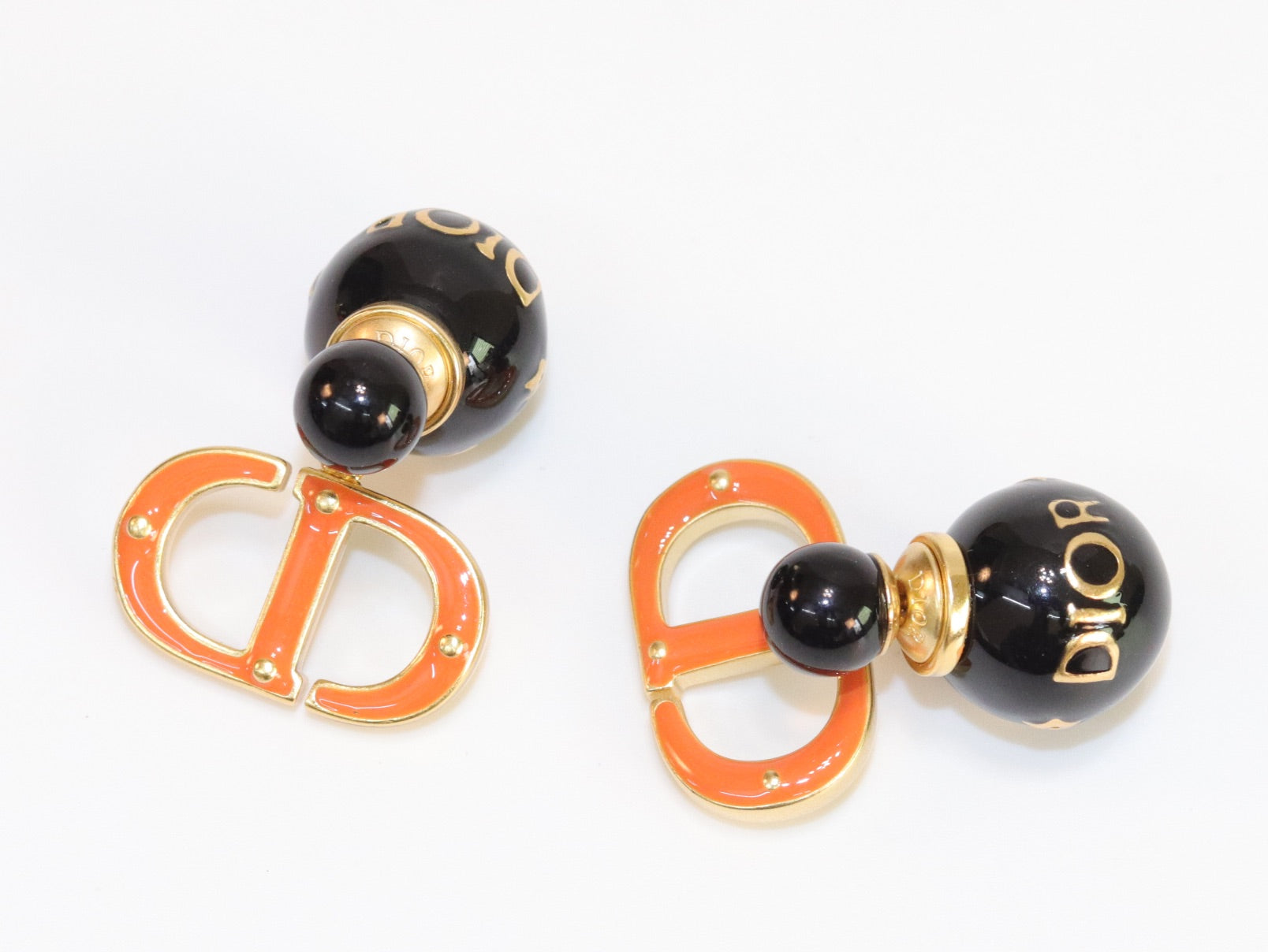 Black and Orange alphabet C and D stud in gold finish