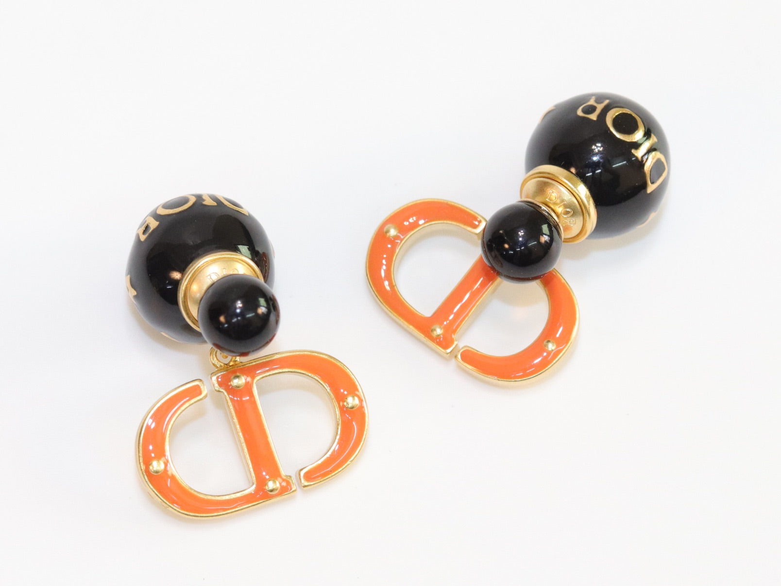 Black and Orange alphabet C and D stud in gold finish