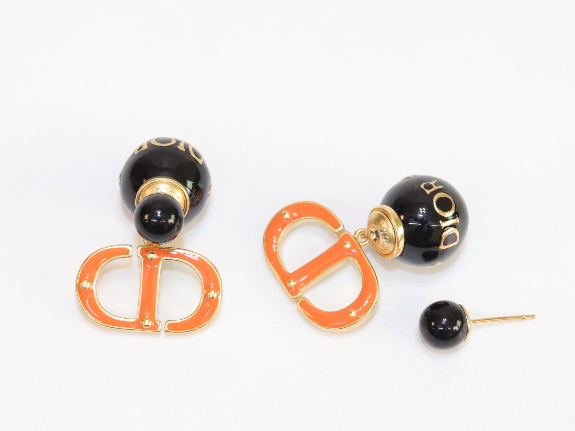Black and Orange alphabet C and D stud in gold finish