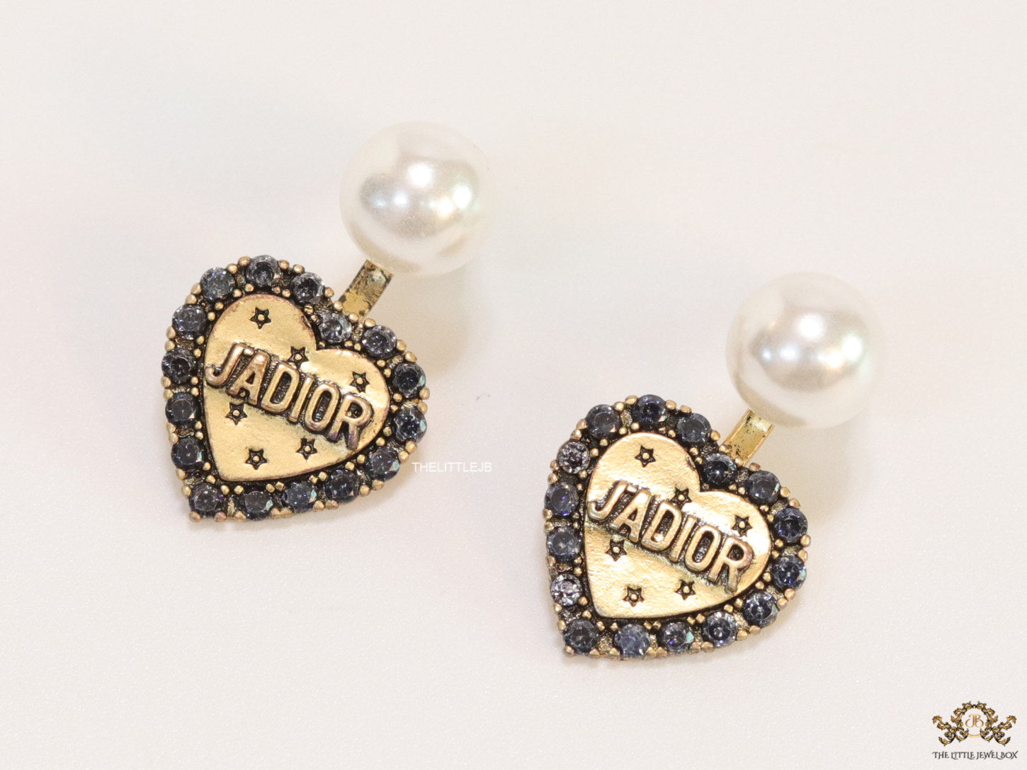 Pearl tops with alphabet inscribed cz and golden heart drops