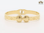 Embossed gold bracelet