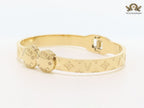 Embossed gold bracelet