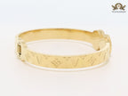 Embossed gold bracelet