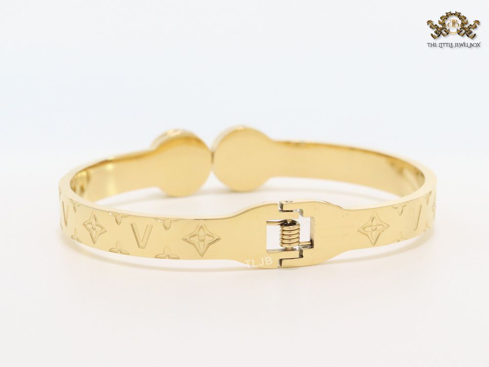 Embossed gold bracelet