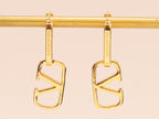 Alphabet V interlocked hoops in gold finish