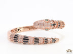 Top open serpentine black enamel bracelet with rose gold plating and cubic zirconia stones