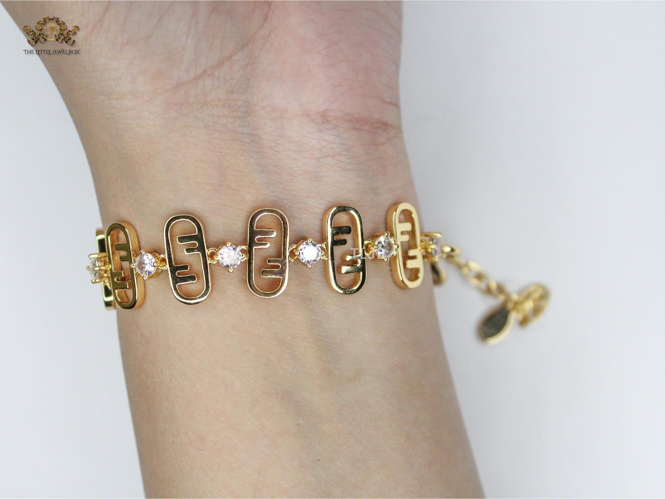 Alphabet F studded gold bracelet