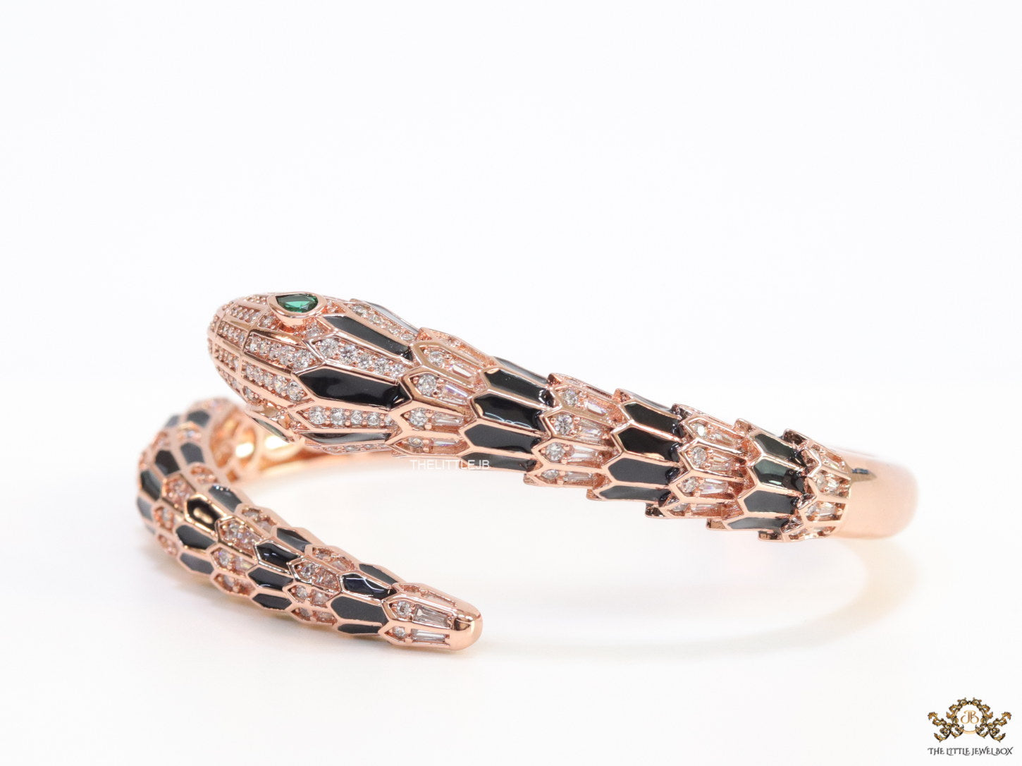Top open serpentine black enamel bracelet with rose gold plating and cubic zirconia stones