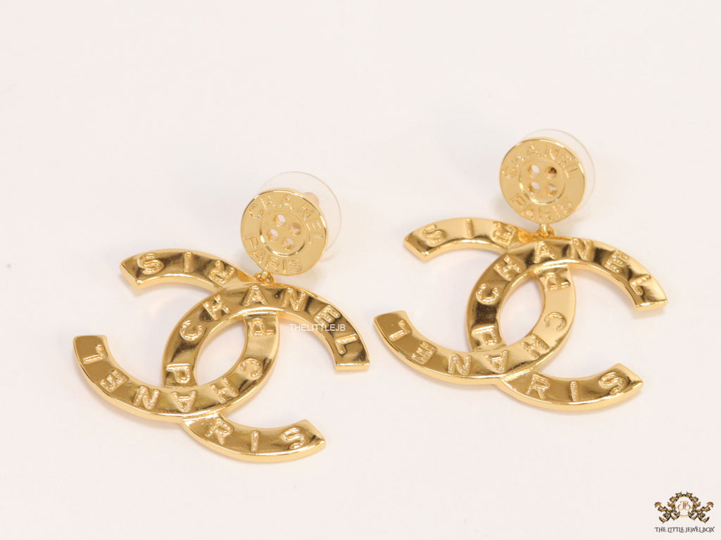 Golden button tops with alphabet inscribed twin C drops