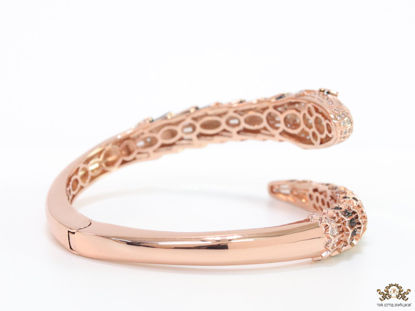 Top open serpentine black enamel bracelet with rose gold plating and cubic zirconia stones