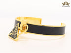 Black alphabet charm bracelet