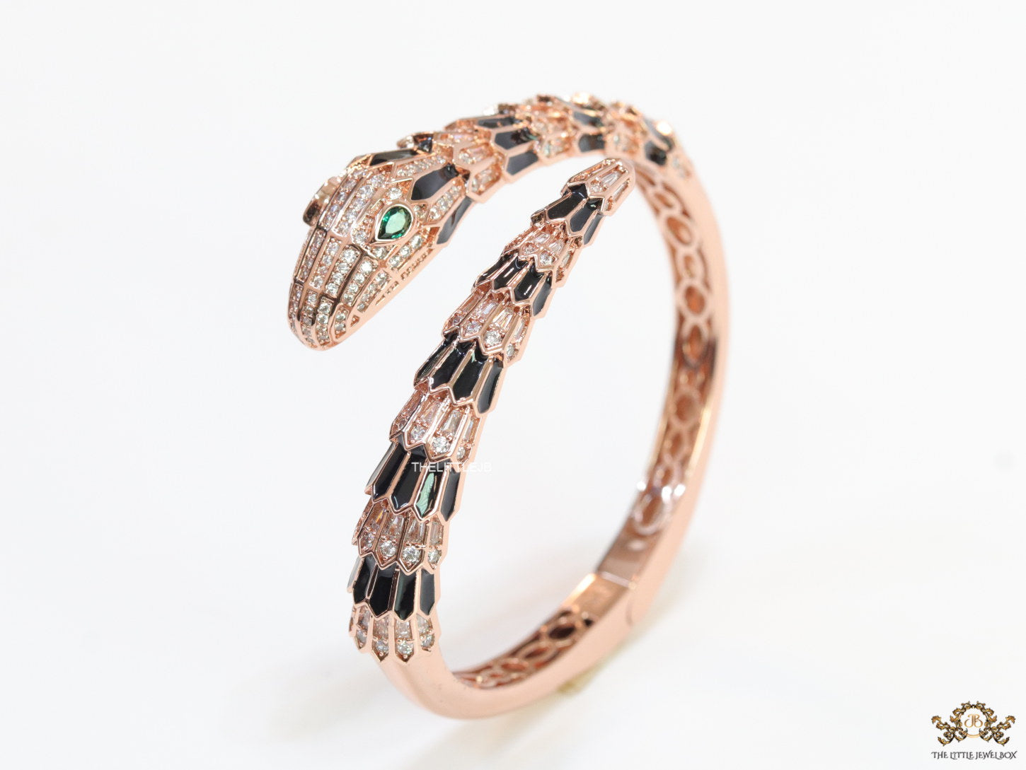 Top open serpentine black enamel bracelet with rose gold plating and cubic zirconia stones