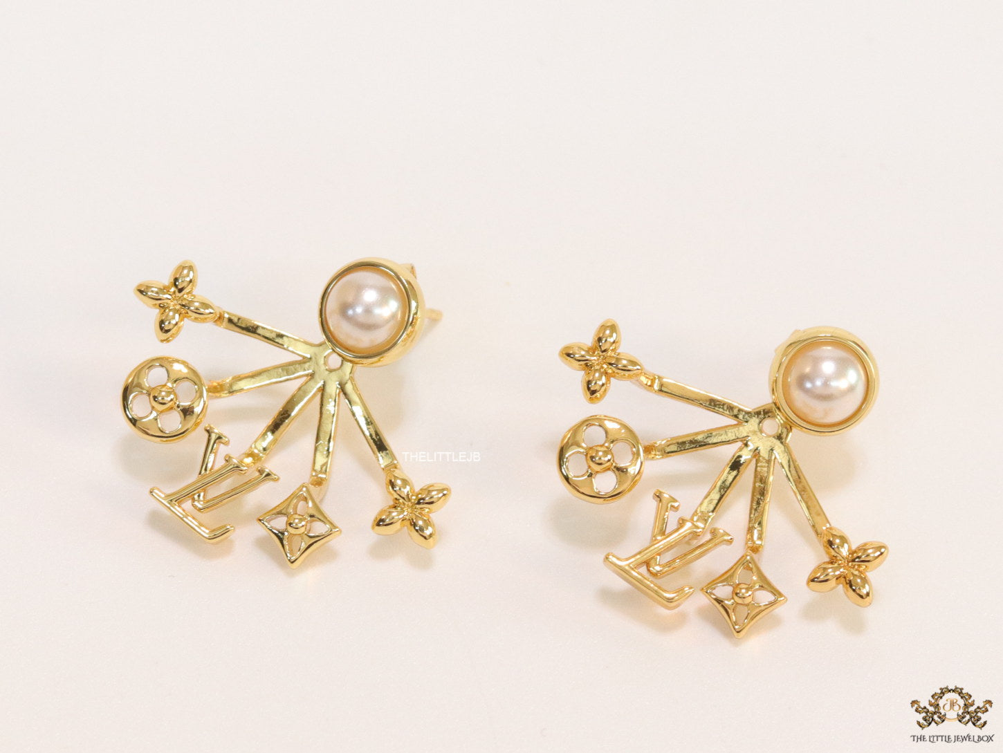 Gold plated detachable pearl tops earrings with various charms