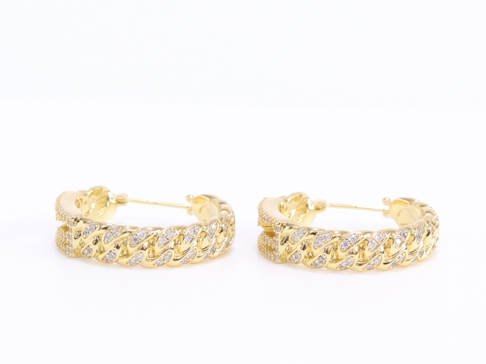 Double F hoops in gold finish with cz