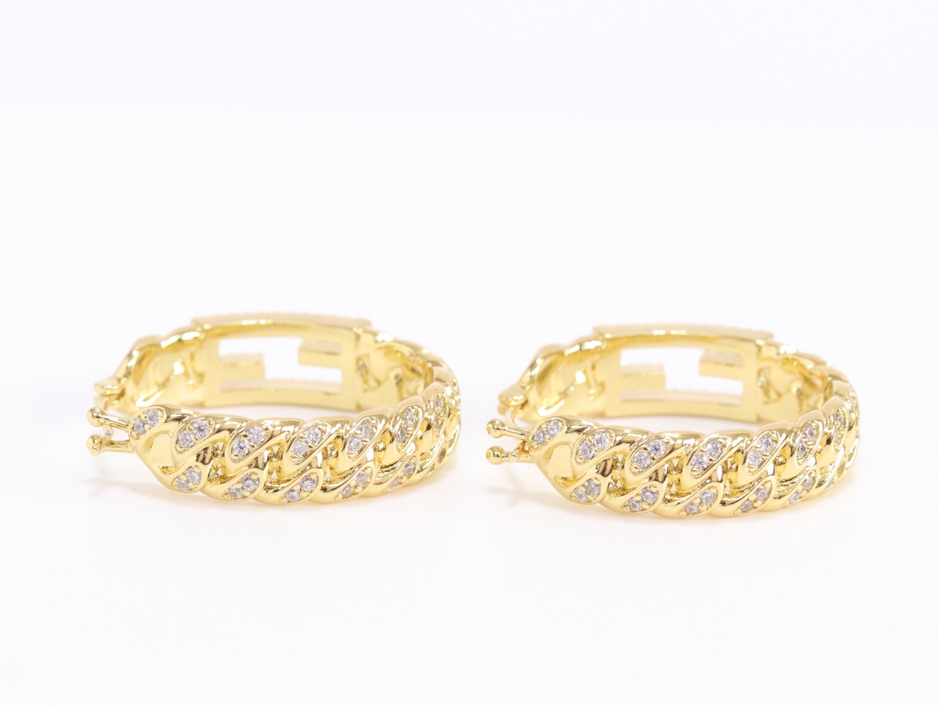 Double F hoops in gold finish with cz