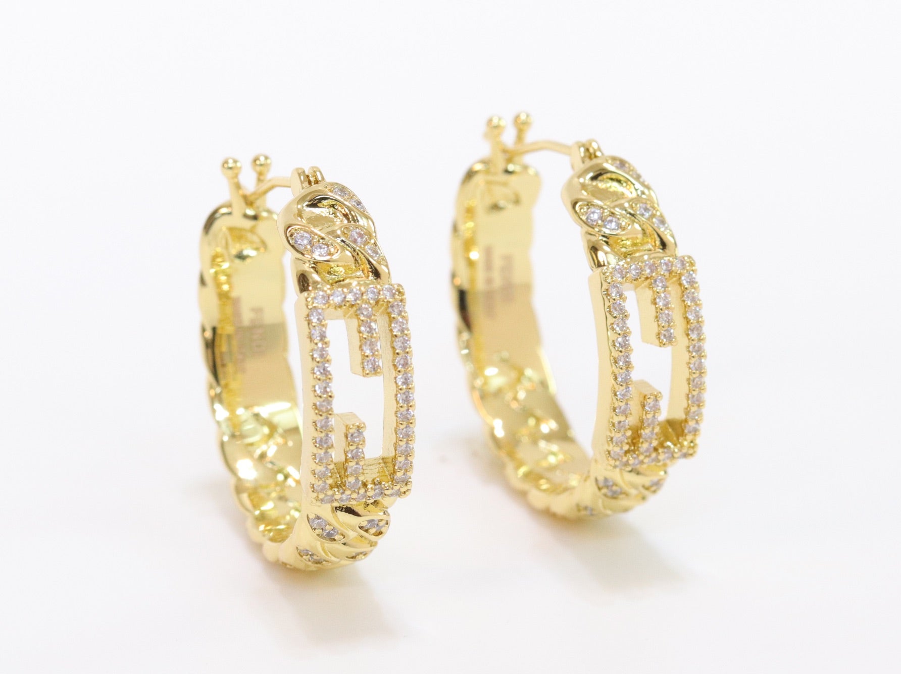 Double F hoops in gold finish with cz