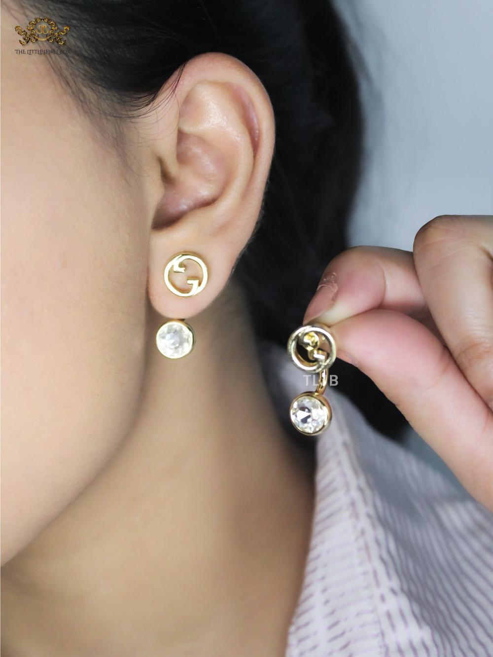Double G earrings with CZ in gold