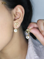 Double G earrings with CZ in gold