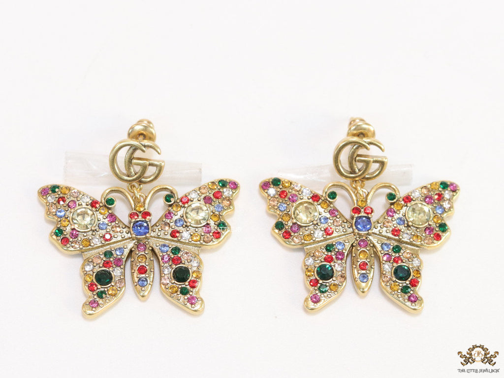 Gold plated twin G motif earrings with multi cz butterfly drops