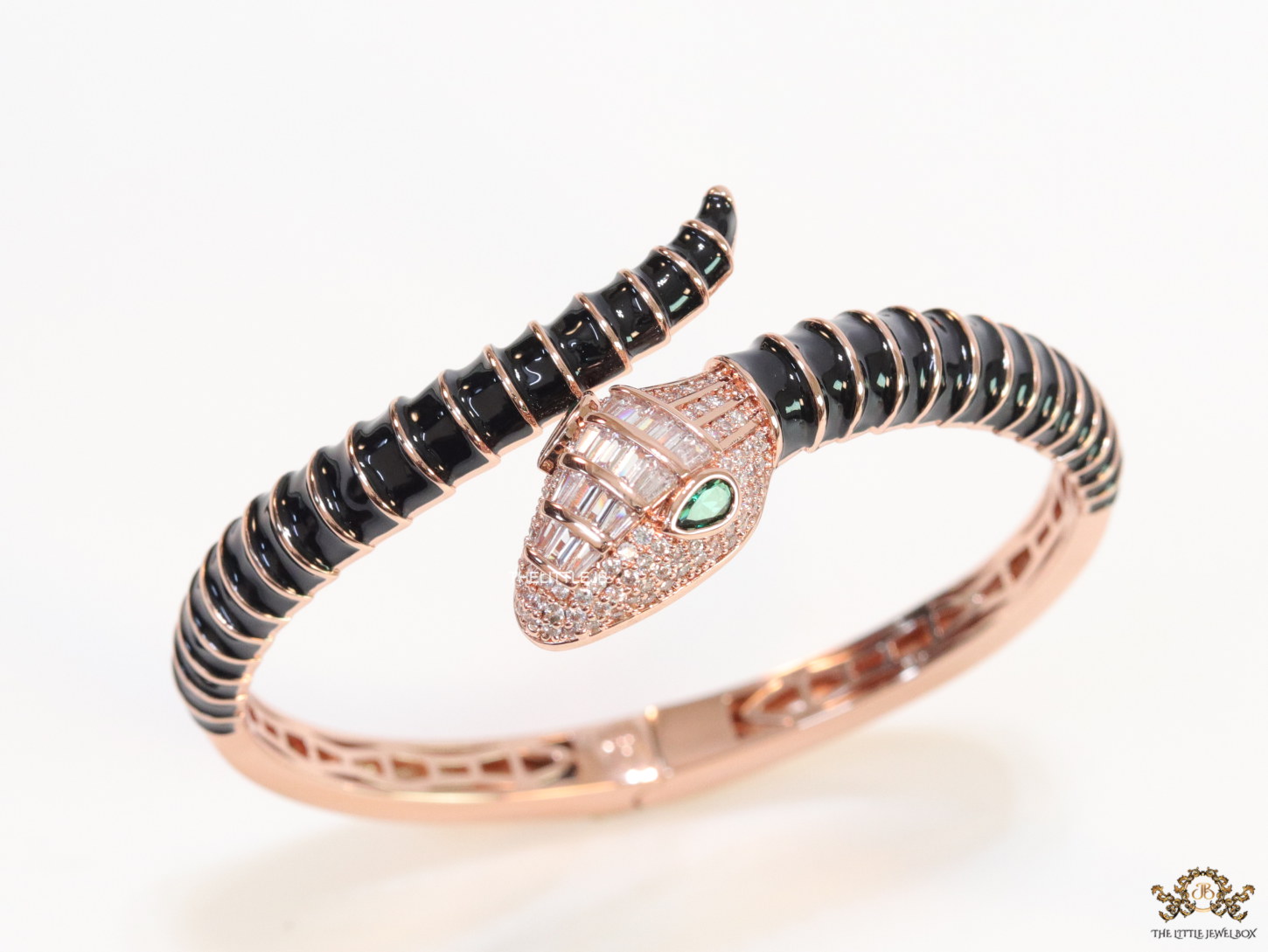 Top open snake bracelet in black enamel with rose gold plated details and cubic zirconia stones head
