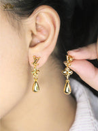 Alphabet L & V Gold drop earrings