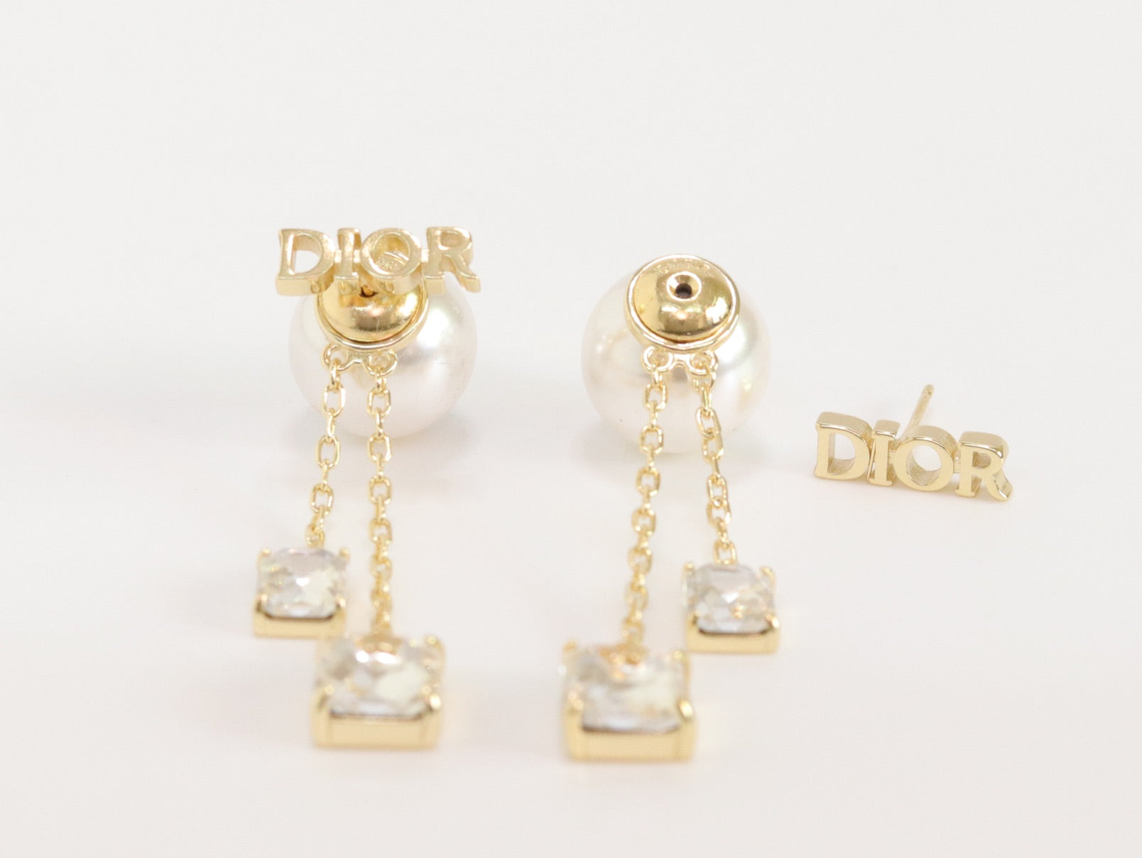 Alphabet C and D dangling pearl studs with CZ