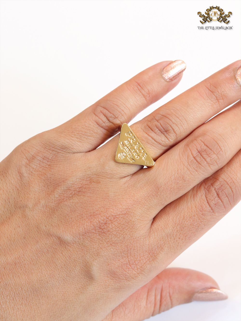Alphabet embossed gold plated ring
