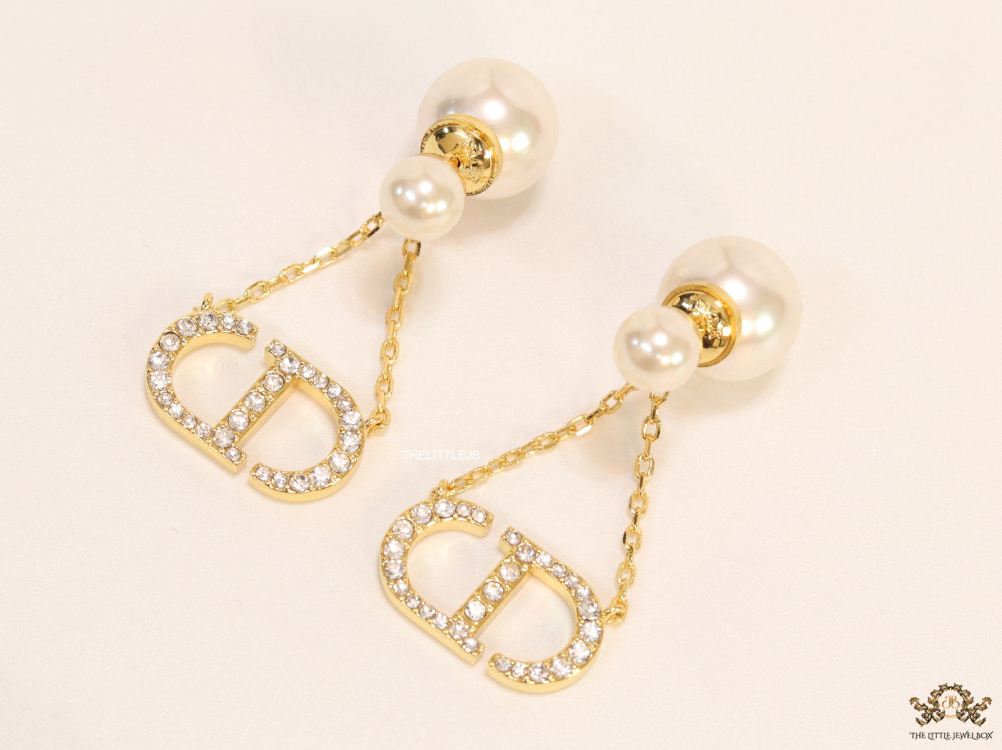 Pearl bomber earrings with cz alphabet initials in drop chains