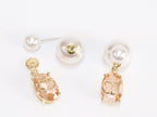 Alphabet C and D dangling baby pink stone pearl studs in rose gold finish