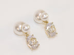 Alphabet C and D dangling stone pearl studs in platinum finish