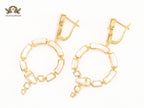 White & gold MOP statement dangles