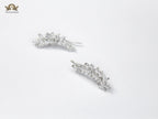 Diamond-Studded Leaf Climber Earrings in silver