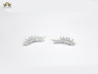 Diamond-Studded Leaf Climber Earrings in silver