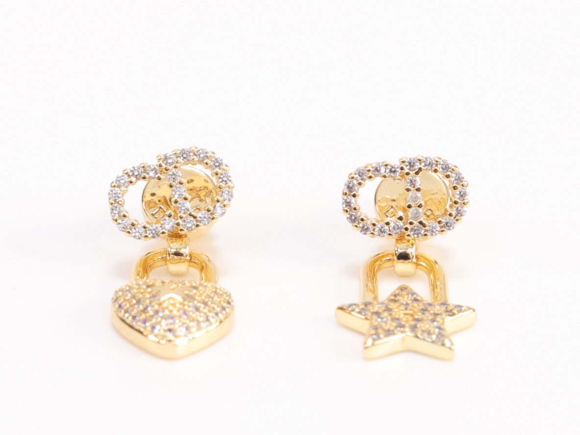 Alphabet C and D lock and star dangling stud in gold finish with cz