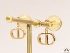 Golden pearl bomber earrings with alphabet initial drops