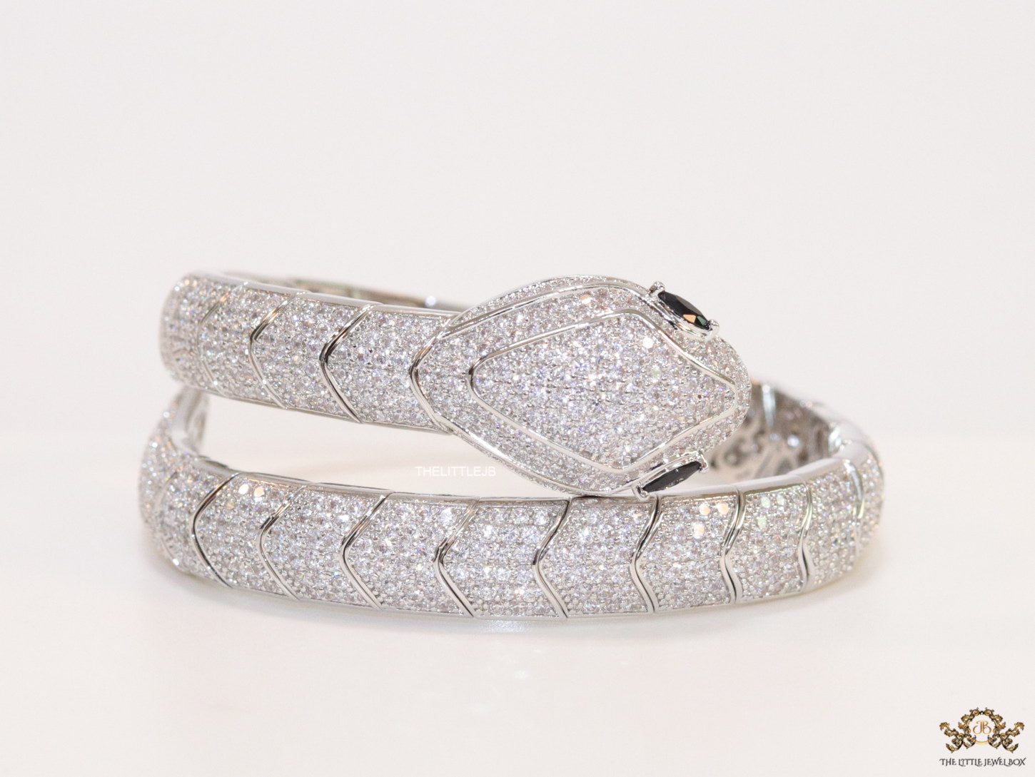 Cubic zirconia stones snake bracelet with platinum plated details black cubic zirconia stone details