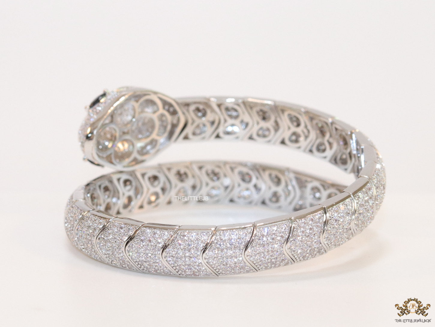 Cubic zirconia stones snake bracelet with platinum plated details black cubic zirconia stone details