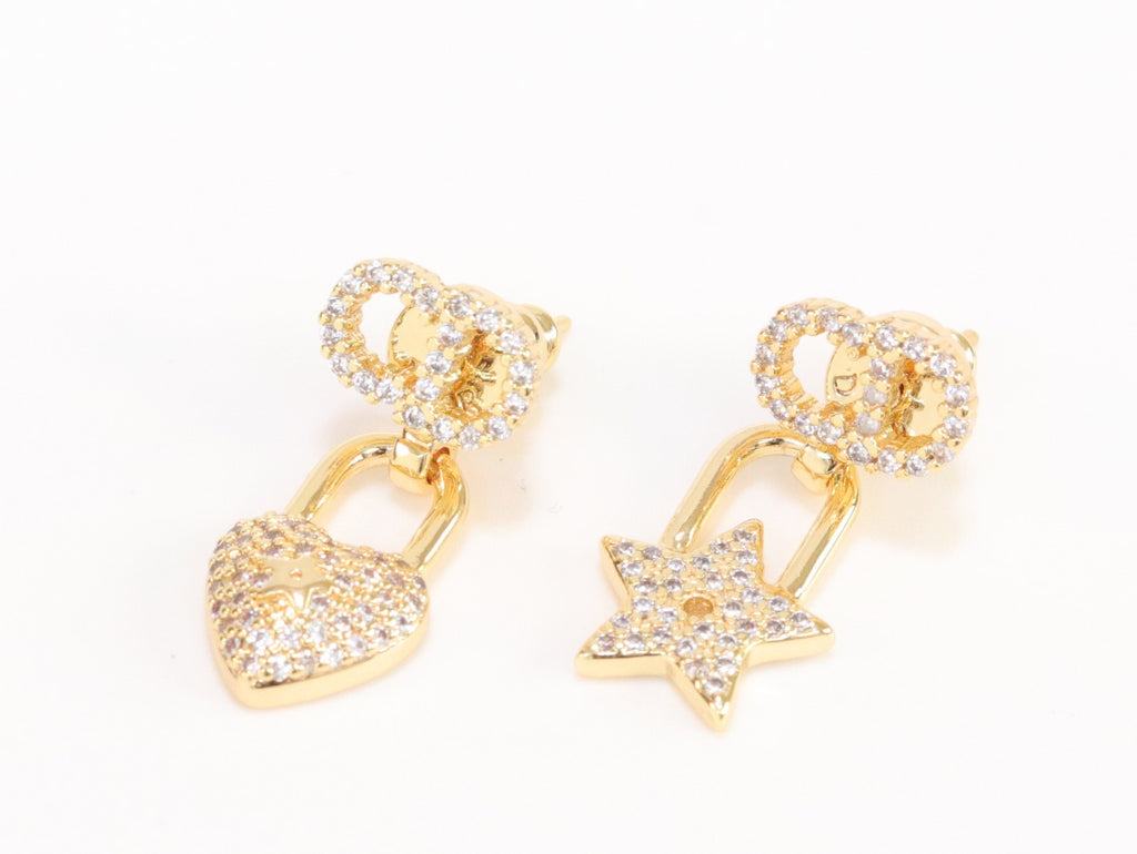 Alphabet C and D lock and star dangling stud in gold finish with cz