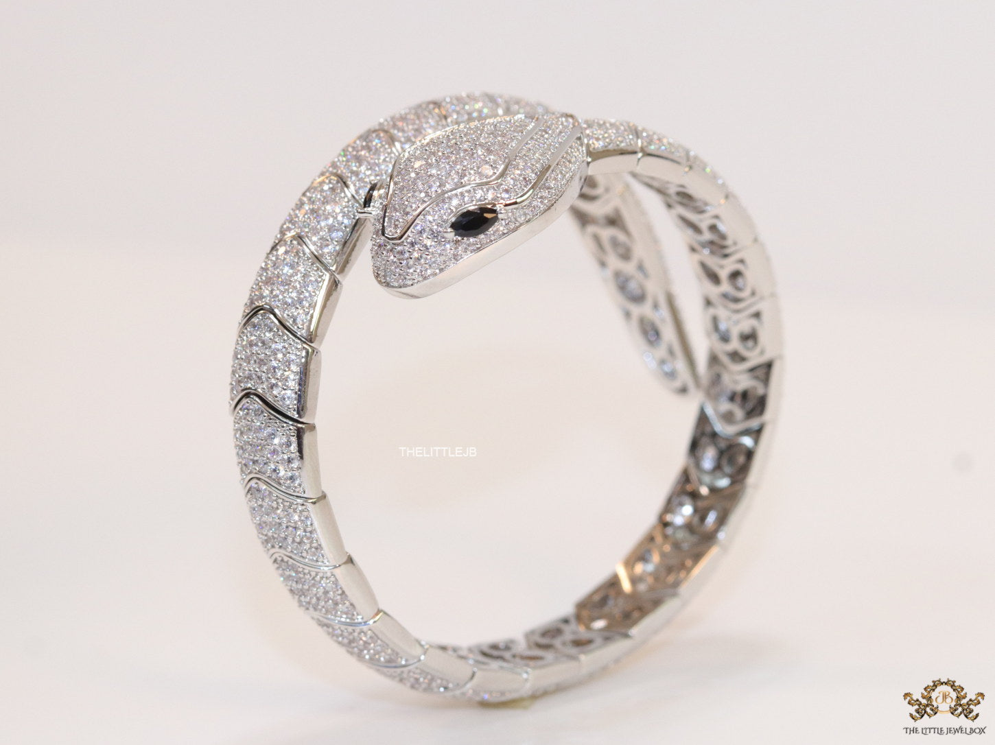 Cubic zirconia stones snake bracelet with platinum plated details black cubic zirconia stone details