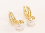 Alphabet V pearl dangling studs in gold finish