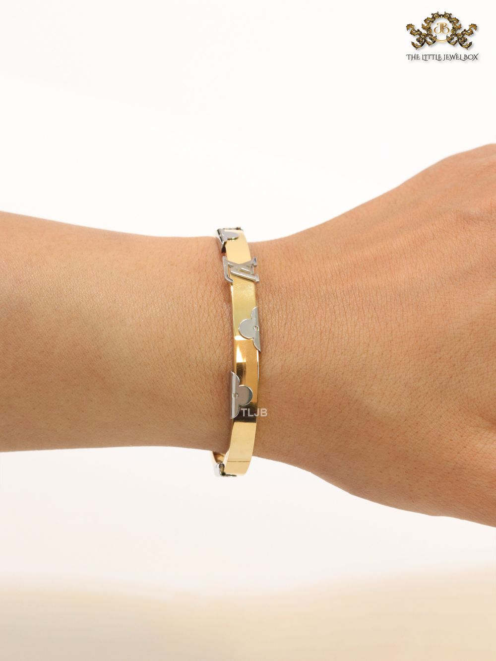 Alphabet L- platinum and gold bracelet