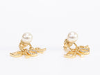 Alphabet CD dangling pearl studs in gold finish with CZ