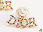 Pearl bomber earrings with golden and multi cz alphabet drop charms