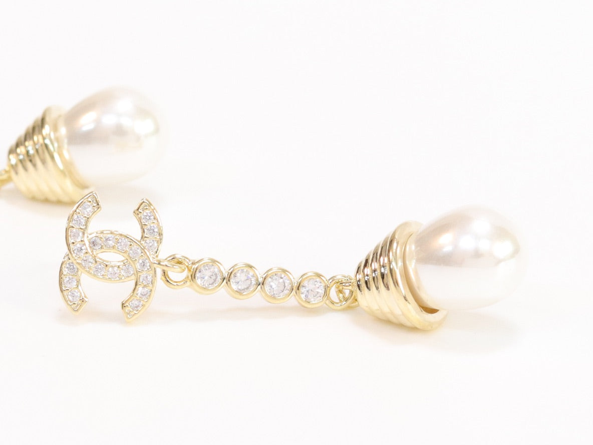 Double C long dangling earrings with pearls in gold finish