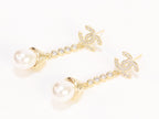 Double C long dangling earrings with pearls in gold finish