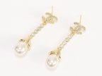 Double C long dangling earrings with pearls in gold finish
