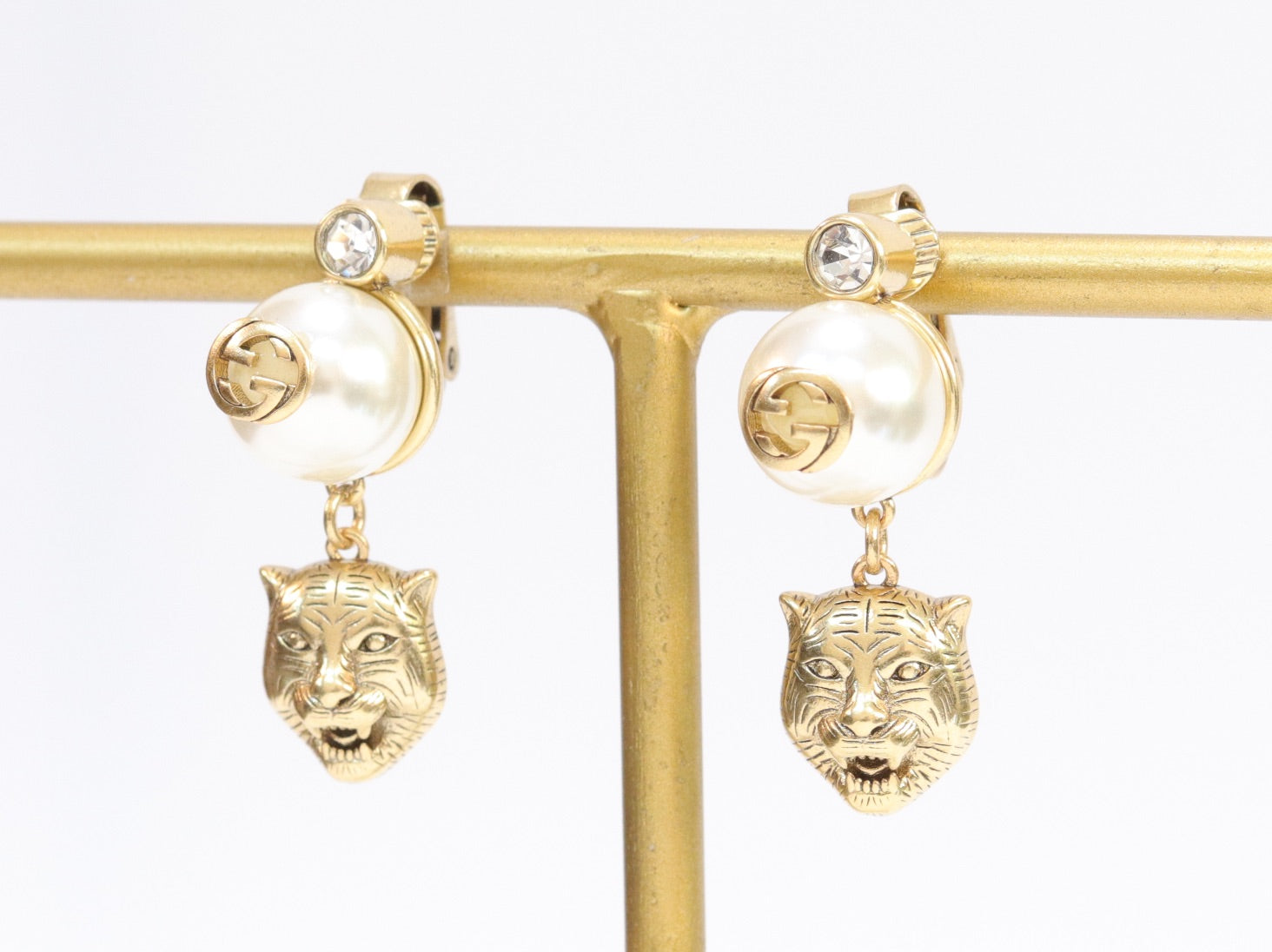 Double G panther pearl dangles in gold finish with CZ