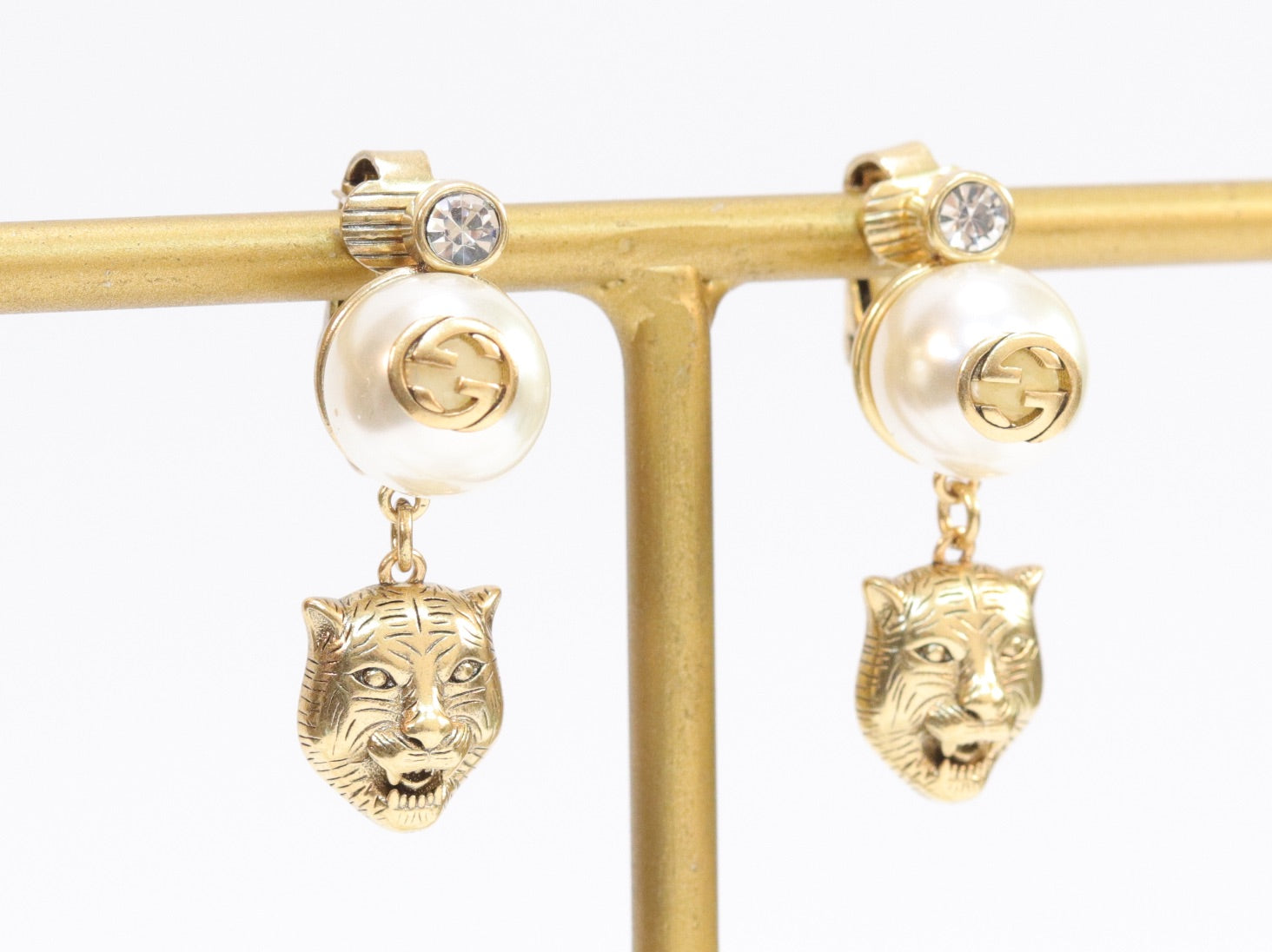Double G panther pearl dangles in gold finish with CZ